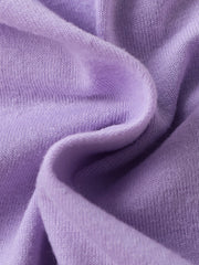 Lavender baby set fabric detail, soft knit texture.