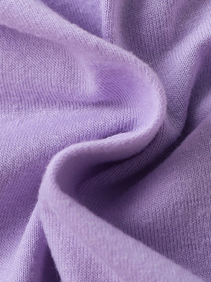 Lavender baby set fabric detail, soft knit texture.
