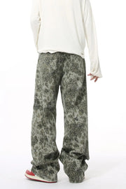 Camouflage wide-leg denim trousers in Sage, featuring a relaxed fit and casual style.