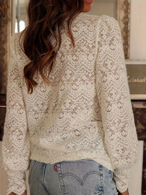 White lace sheer button-up blouse with long puff sleeves and intricate scalloped pattern.