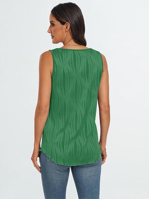 Textured wave tank top in dark green with a curved hem.
