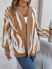 Caramel and white zebra stripe open-front knit cardigan with ribbed trim.
