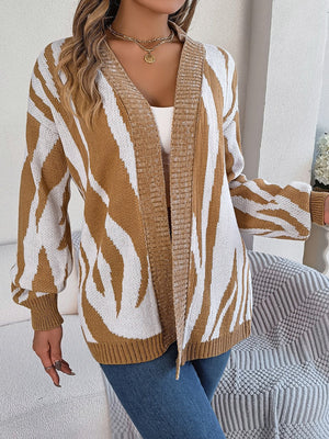 Caramel and white zebra stripe open-front knit cardigan with ribbed trim.