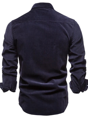 Indigo corduroy utility shirt with button-down collar and long sleeves, back view.