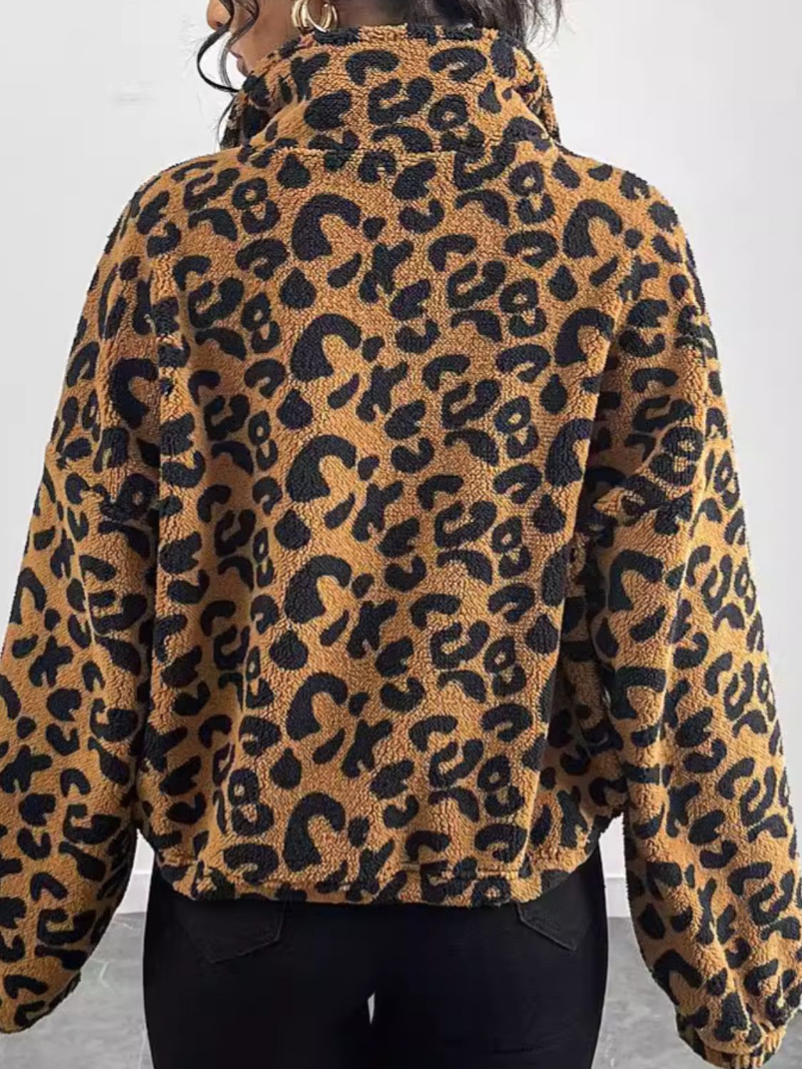 Caramel leopard print sherpa bomber jacket with a high neck and long sleeves.