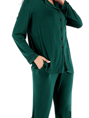 Green piped trim pajama set with pockets and button front.