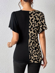 Black and leopard print asymmetric paneled top with short sleeves.