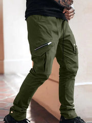 Army green slim cargo trousers with zip pockets and drawstring waist.