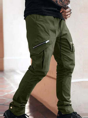 Army green slim cargo trousers with zip pockets and drawstring waist.