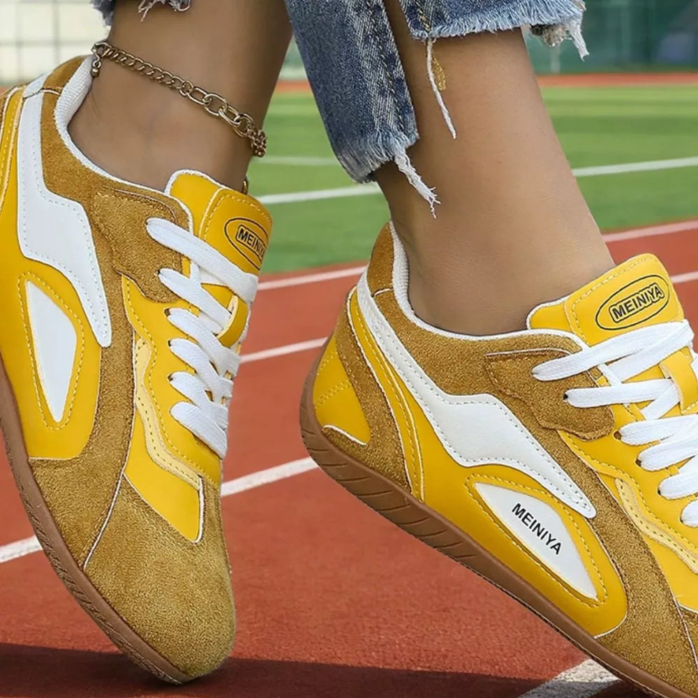 Round Toe Lace Up Sneakers in White, model styling view