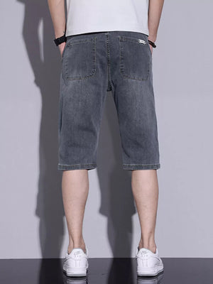 Men's classic denim shorts in a dark grey wash, featuring a button-down closure and casual fit.