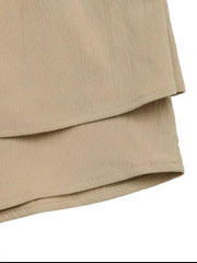 Tiered ruffle mini skirt in tan with textured fabric and visible stitching detail.