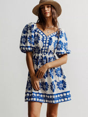 Blue floral puff sleeve mini dress with V-neck and button detail