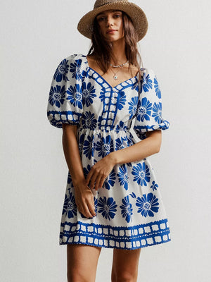Blue floral puff sleeve mini dress with V-neck and button detail