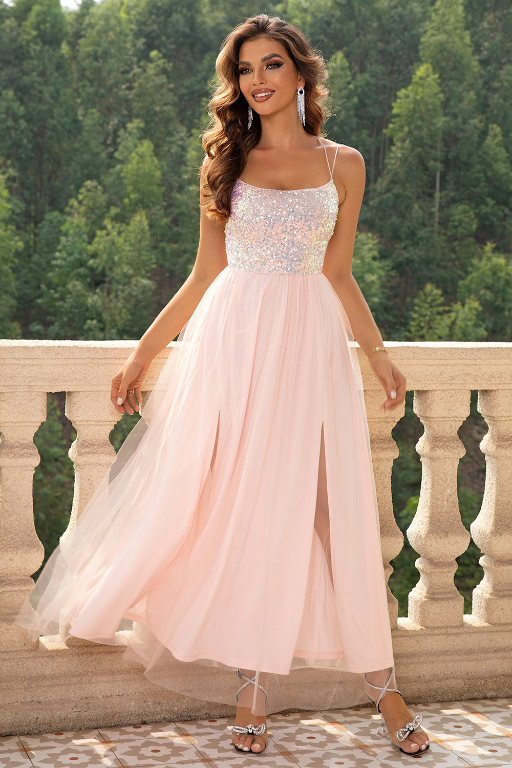 Blush pink tulle maxi dress with sequin bodice and double thigh slits.