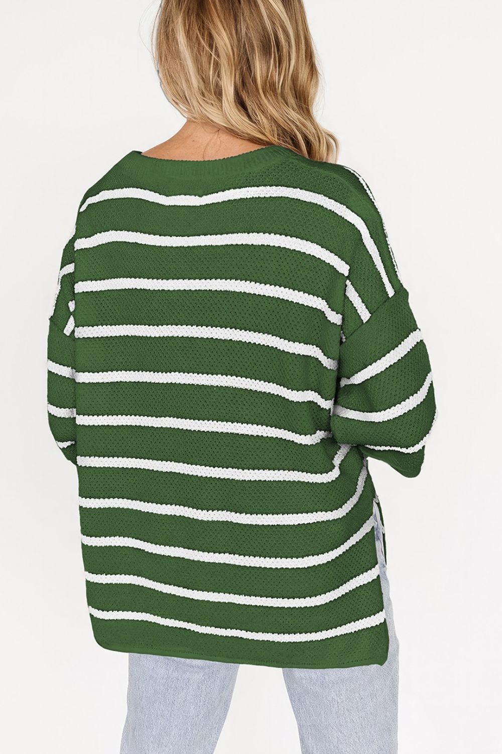 Dark green and white striped knit pullover sweater with a crew neck.