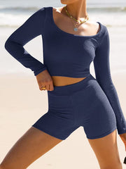 Textured ribbed scoop neck crop top and shorts set in dark blue.