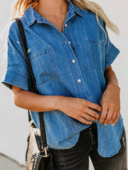Denim button-front shirt in dark blue with short sleeves and two chest pockets.