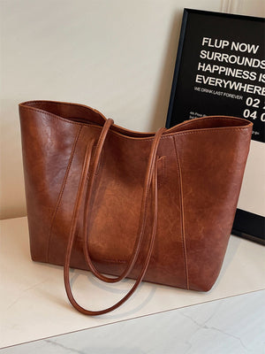 Premium crinkled pu leather tote bag in coffee brown with double shoulder straps.