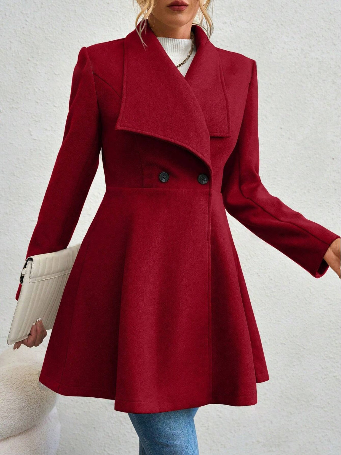 Rust draped collar flare-hem coat with double-breasted buttons and a chic silhouette.