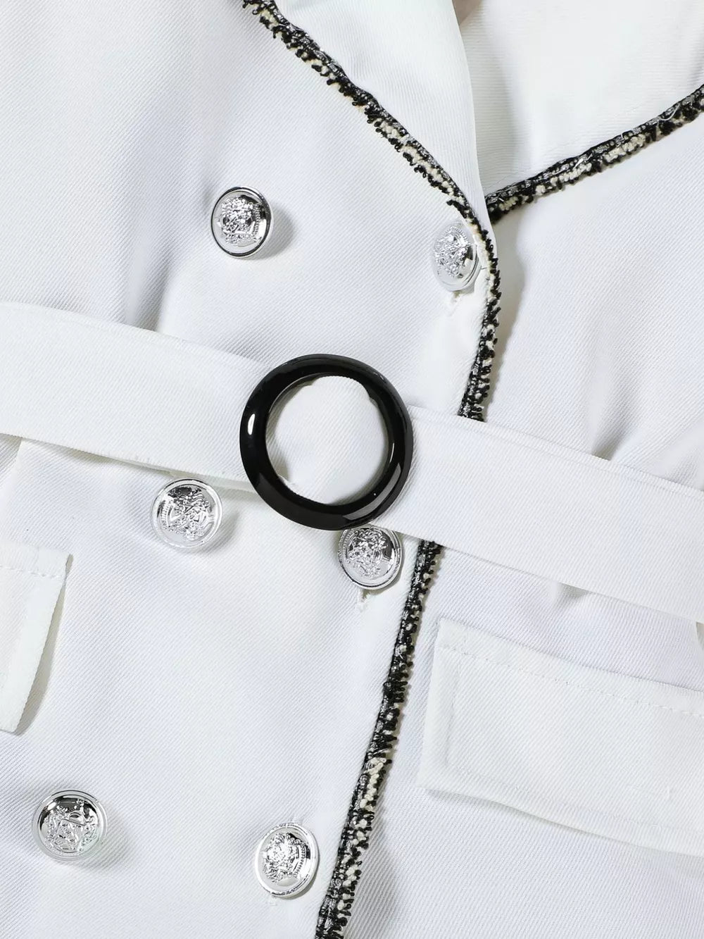 White double-breasted toddler dress with belted waist and decorative buttons.