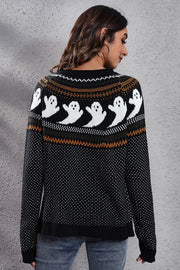 Black crewneck sweater with white ghost jacquard pattern and striped yoke.