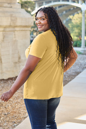 Yellow V-neck pocket tee with short sleeves and a relaxed fit.