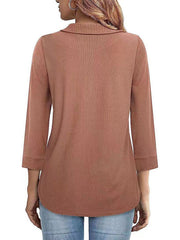 Textured polo top in dusty pink with 3/4 sleeves and a collared neckline.