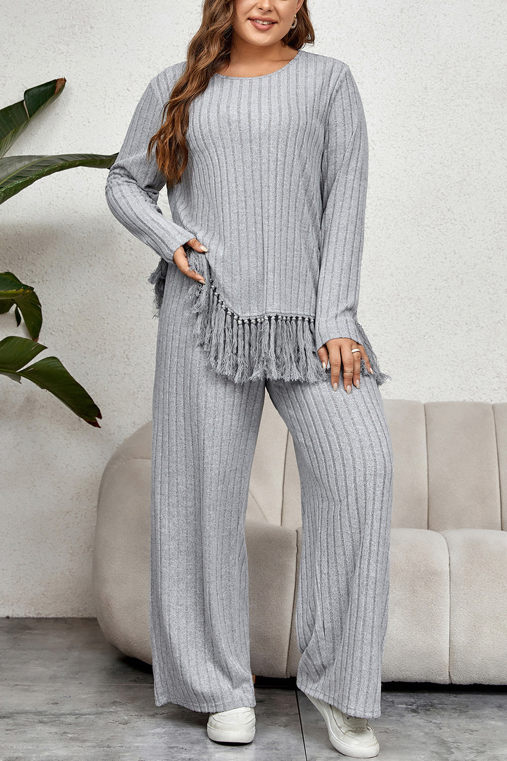 Ribbed lounge set in grey with fringe hem detail and wide leg pants.