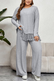 Ribbed lounge set in grey with fringe hem detail and wide leg pants.