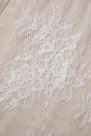 Lace-embellished midi t-shirt dress in cotton with intricate floral lace overlay.