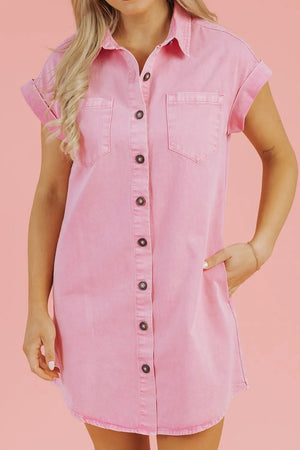 Rolled sleeve denim shirtdress in blush pink with button front and chest pockets.