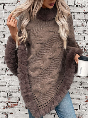 Mocha cable knit poncho with faux fur trim and turtleneck.
