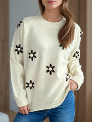 Cream embroidered floral raglan knit sweater with beaded flower details.