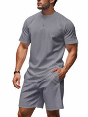 Men's light gray striped two-piece set with crew neck t-shirt and shorts.