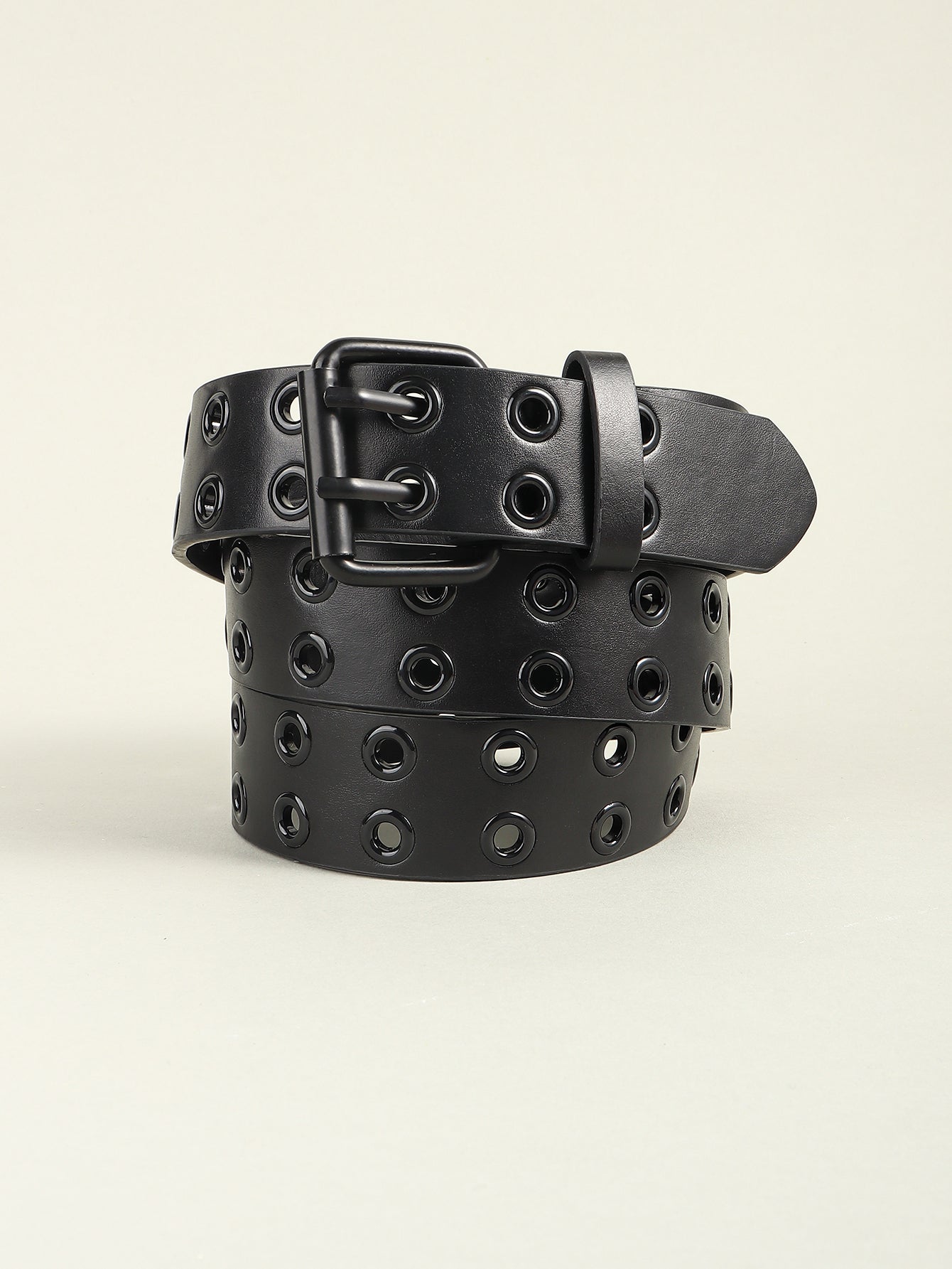 Black vegan leather belt with double row grommets and black alloy buckle.