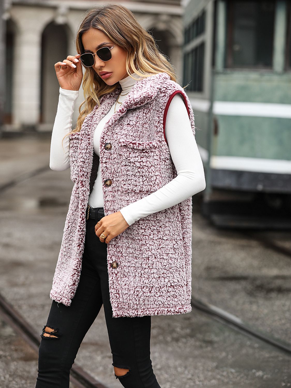 Teddy Sherpa Utility Vest in Dusty Pink with button front and pocket details.