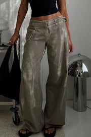 Utility buckle flared denim trousers in dark gray with a wide leg and pocket detail.