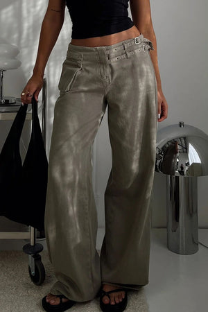 Utility buckle flared denim trousers in dark gray with a wide leg and pocket detail.