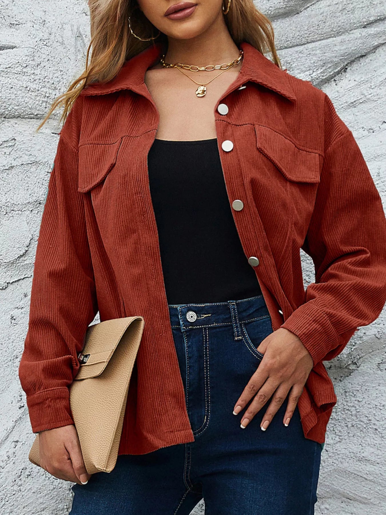 Textured corduroy button-up jacket in Amber with silver buttons and chest pockets.