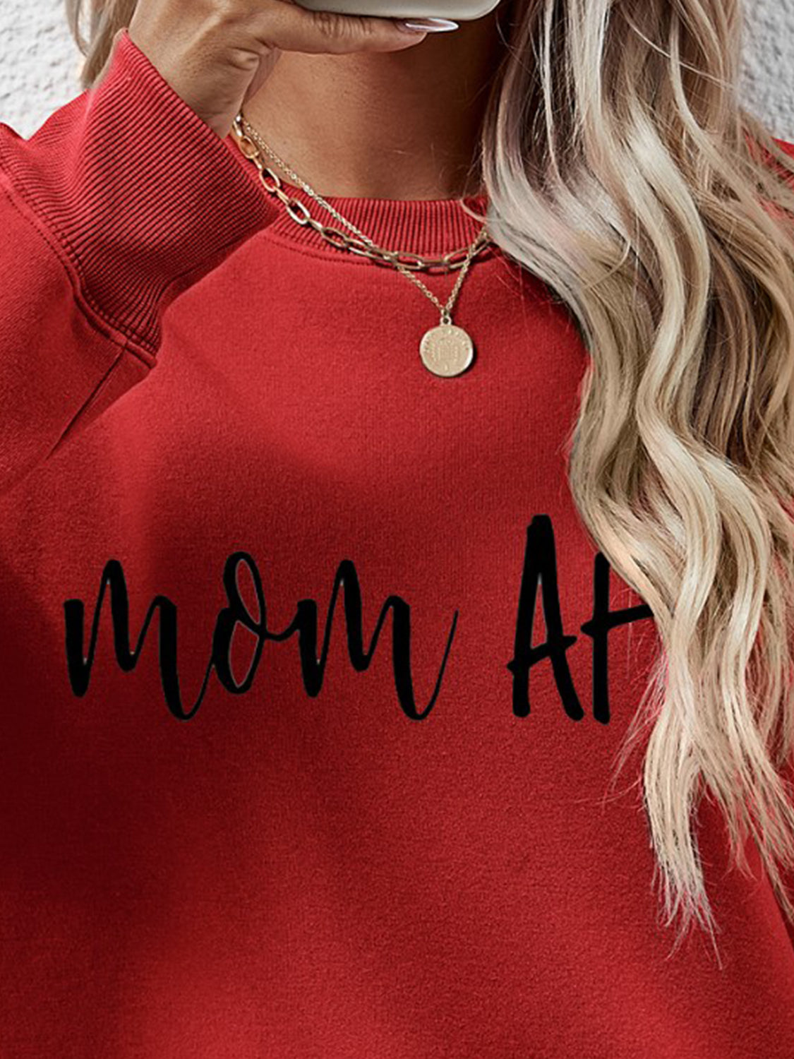 Deep Red graphic sweatshirt with black "mom AF" text, crewneck, and long sleeves.