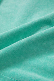 Mineral washed drawstring waist shorts in teal cotton fabric detail.