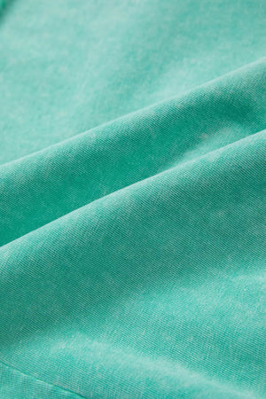 Mineral washed drawstring waist shorts in teal cotton fabric detail.