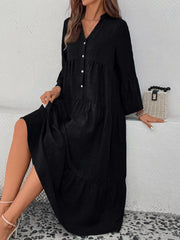 Black tiered ruffle hem v-neck dress with button front and bell sleeves.