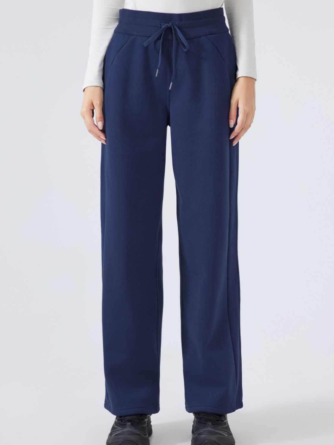 Dark blue relaxed palazzo sweatpants with drawstring waist and pockets