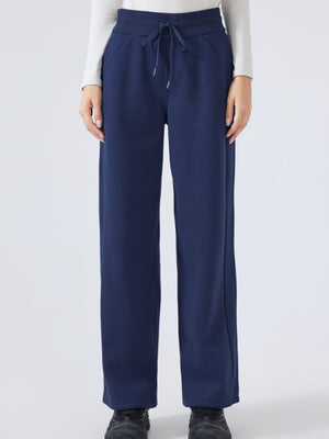Dark blue relaxed palazzo sweatpants with drawstring waist and pockets