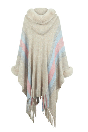 Textured stripe poncho with faux fur trim, hood, and fringe detail.