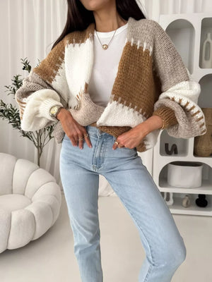 Open front cardigan with balloon sleeves in brown and white stripe pattern.