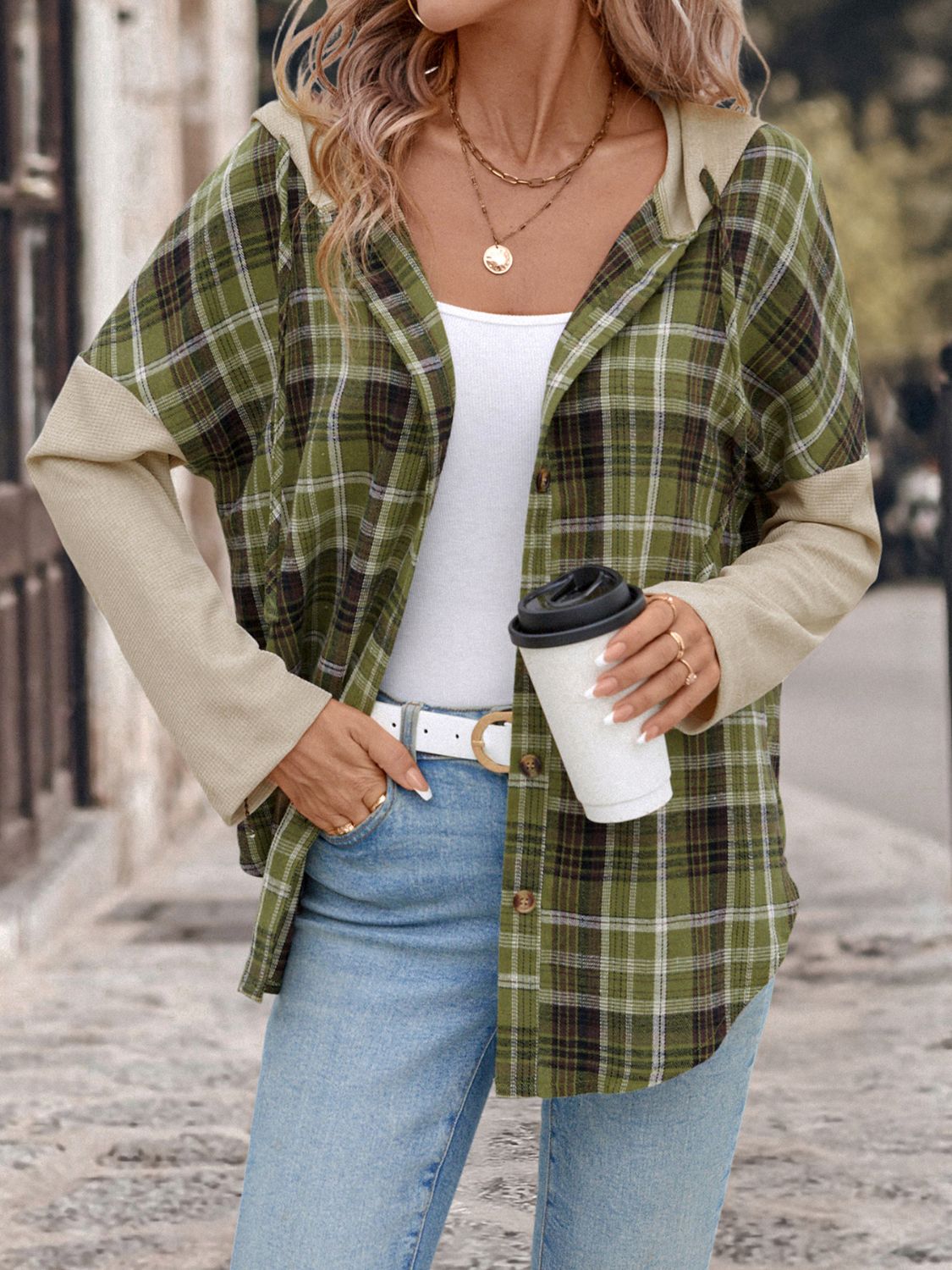 Colorblock plaid hooded shirt jacket in matcha green with contrast waffle knit sleeves.