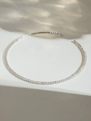 Silver collar necklace with a row of diamonds